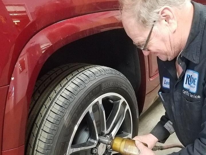 technician working on wheels